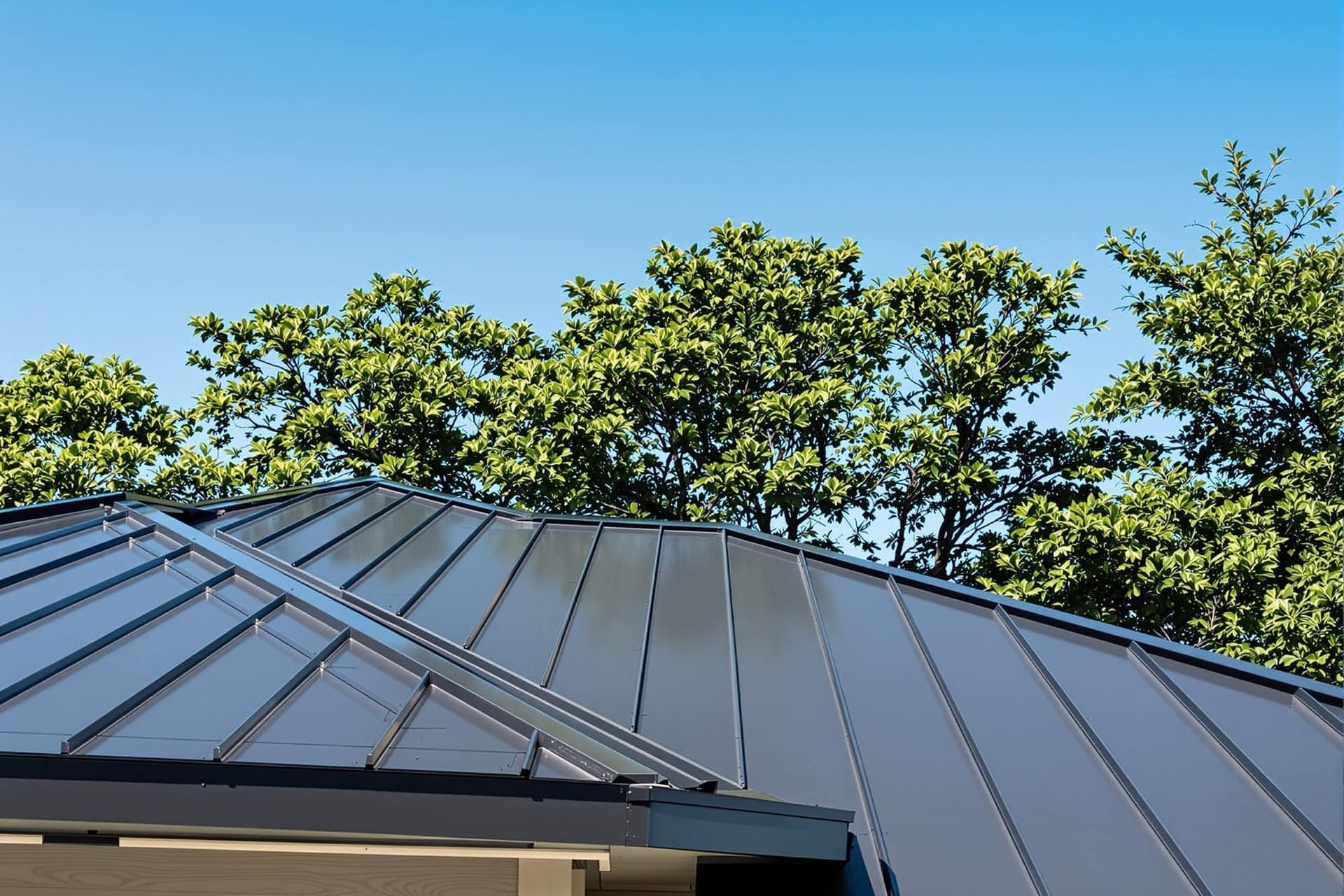 A new charcoal standing-seam metal roof on a modern Austin home